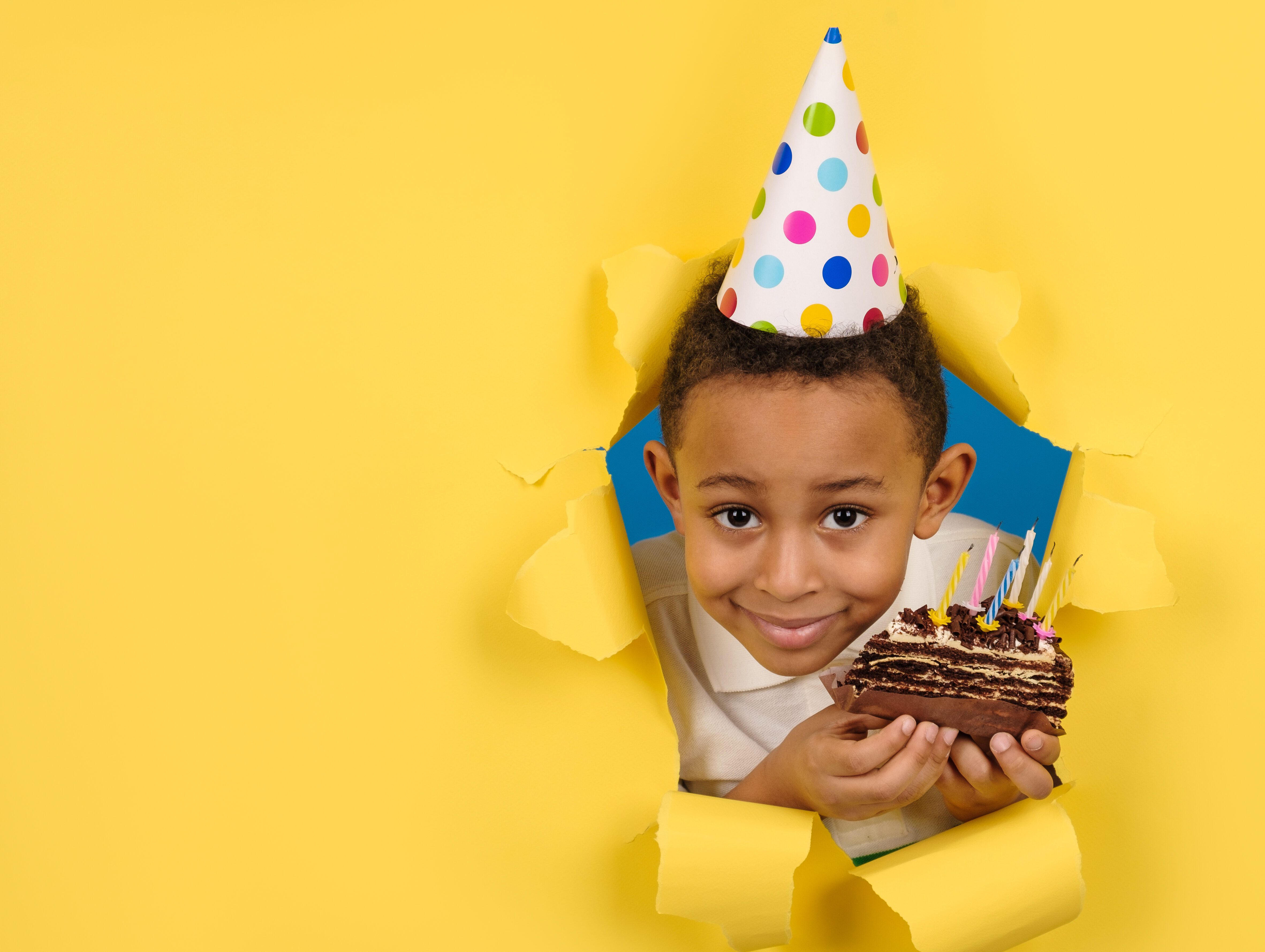 Happy,African-american,Boy,Celebrates,Birthday,By,Holding,A,Chocolate,Cake